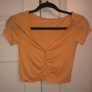 Crop button up shirt from Pacsun. It is super comfortable and soft!